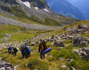 Tourists descend into a mountain gorge in the mountains of Arkhyz