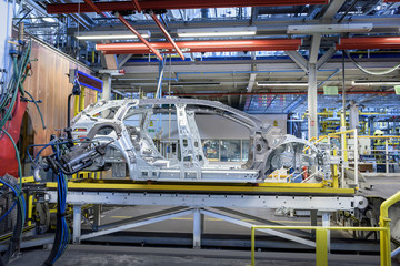 View of cars on production line in factory