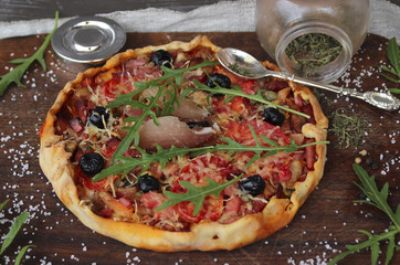 Pizza and arugula. fast food