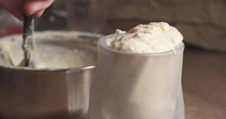 shot of adding dough into pastry bag, 4k photo