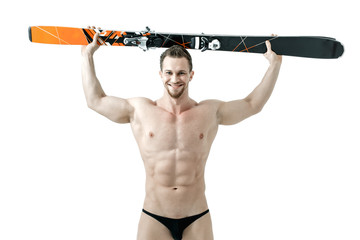 Spotman holds skis on his head. Isolated on white background