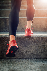 Fototapeta na wymiar Close up image runner legs in running shoes