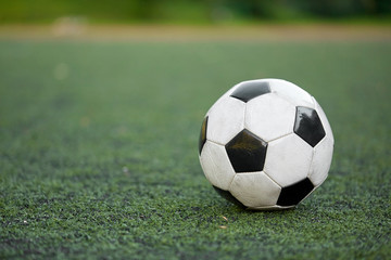 Fototapeta na wymiar soccer ball on football field