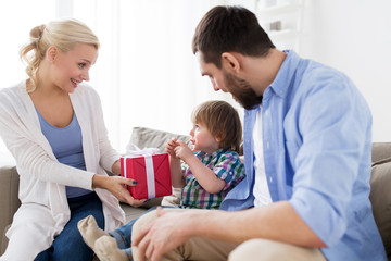 happy family with birthday gift at home