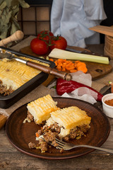Shepherd's pie traditional english dish. Recipe with minced beef, lamb, carrot, onion, celery,...