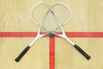 crossed squash rackets top view