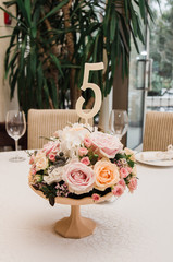 Wedding decorations. Decoration on the table. Flower composition.