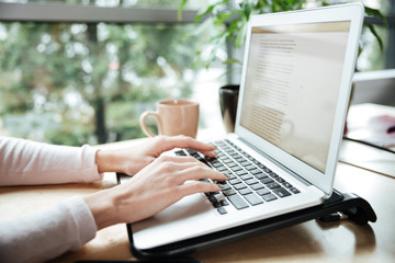 Cropped photo of young woman in office coworking