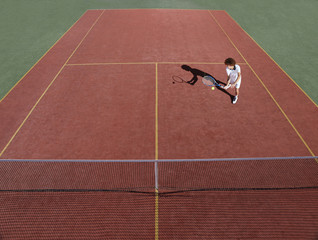 tennis court with tennis player during a match game