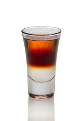 Sambuca and Jagermeister cocktail in shot glass isolated on white