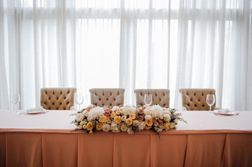 Wedding decorations. Decoration on the table. Flower composition.
