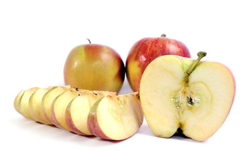 Ripe apples whole and sliced