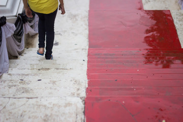 Obraz na płótnie Canvas Long red stairs to the temple.