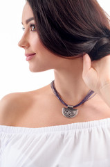 Stylish silver accessory on woman. Necklace with choker on neck. Close-up studio isolated shot of spring jewelry collection