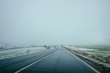 Fototapeta premium Winter road. The track.