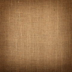 Brown burlap jute canvas background with shade