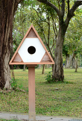 Wooden box/ bird house in a park