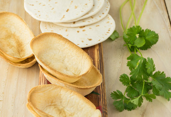 Flour tortillas and mini taco boats - ingredients for taco.