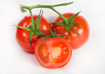 isolated red tomatoes on white background