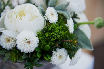 Wedding decor. Floral arrangement with berries white .Floral