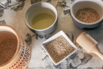 Grated sesame. Pestle and mortar. Top view.