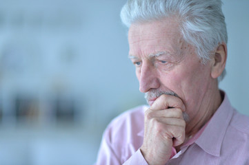 Sad elderly man closeup