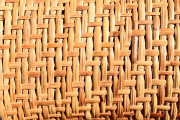 Fototapeta premium Traditional Thailand style pattern nature background of brown handicraft weave texture bamboo surface ,Texture for add text or graphic design