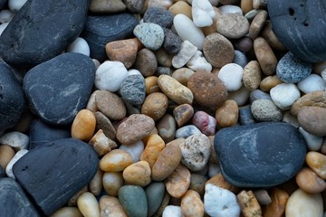 Colorful stones from the sea are a refined material.