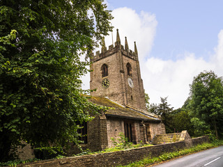 Fototapeta na wymiar St Christophers Church in Pott Shrigley which is in Cheshire East, England. It contains 19 buildings that are recorded in the National Heritage List for England as designated listed buildings 
