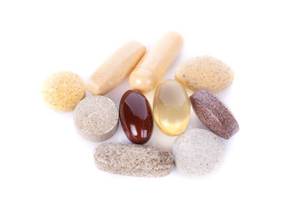 Herbal drugs capsules isolated on white..