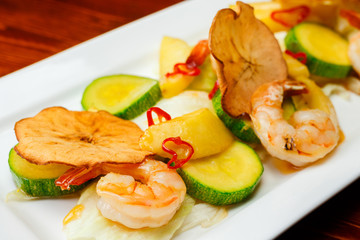 Hot prawn salad with potatoes