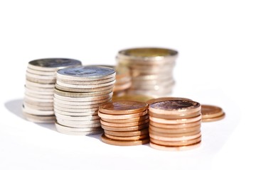 Many stacks of coins in various sizes and valued,Business and finance 