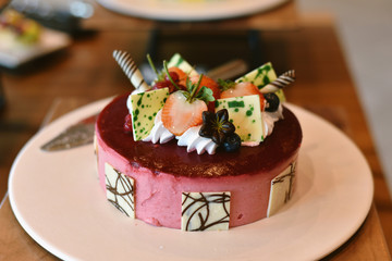 Sweet cake, Raspberry cake with fresh strawberries.