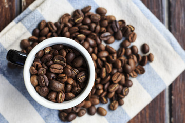 beans in the cup on the wood