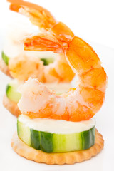 Prawn appetizer. Shrimp with Wasabi Mayonnaise on cucumber bite