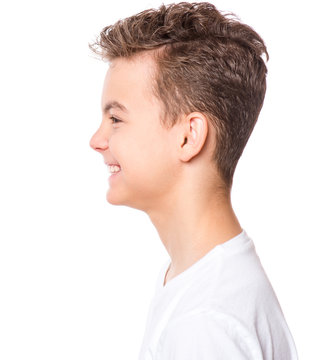 White T-shirt On Teen Boy. Profile Of Handsome Caucasian Smiling Child, Isolated On A White Background. Concept Of Childhood And Fashion Design. 