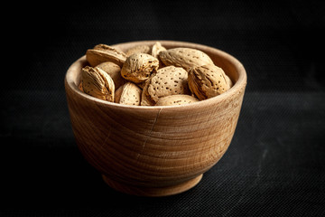 Almonds in a wooden bowl.