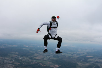 Coll skydiver in the sky