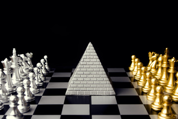 chess game battle for top of pyramid in business winner concept