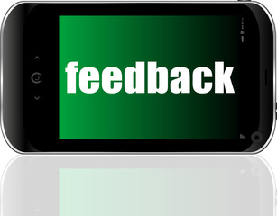 Web design concept. Smartphone with text Feedback on display