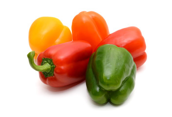 Fresh colorful bell peppers on the white background