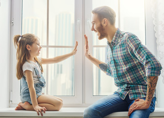 father and daughter play