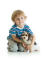 child and yorkshire terrier. isolated on white background