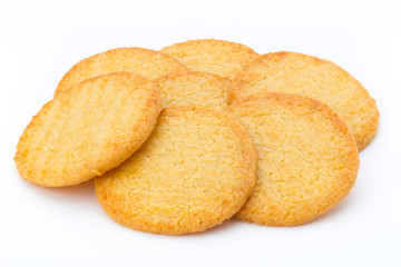 Stacked short pastry cookies isolated on white background.