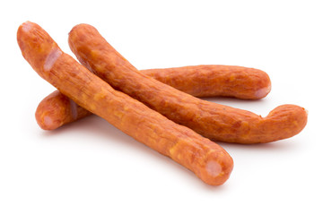 Stack of smoked sausages isolated on a white background.