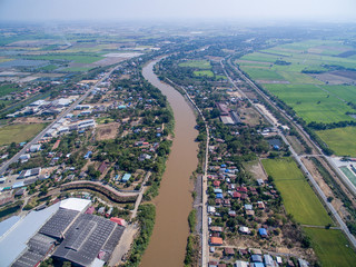 Town and rice farms beside Nan river in Phichit, Thailand