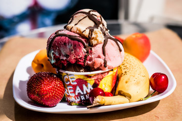 ice cream in cup with fruits