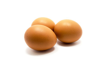 three eggs isolated on white background