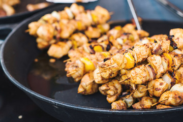 Roasted chicken kebab at seasonal fair.