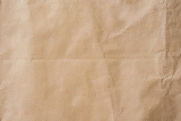 Brown paper crumpled texture and background with space.